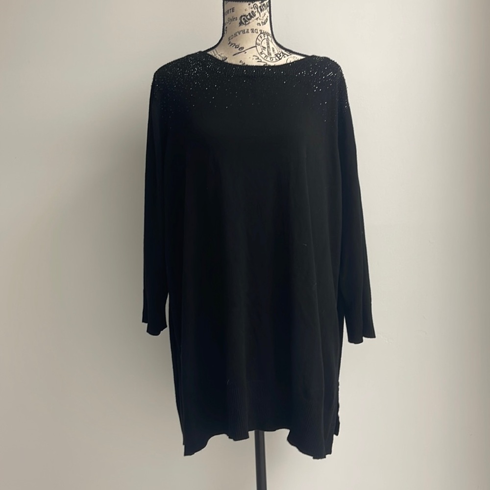 In good used condition Woman’s Cable & Gauge sweater. Size is 2X.